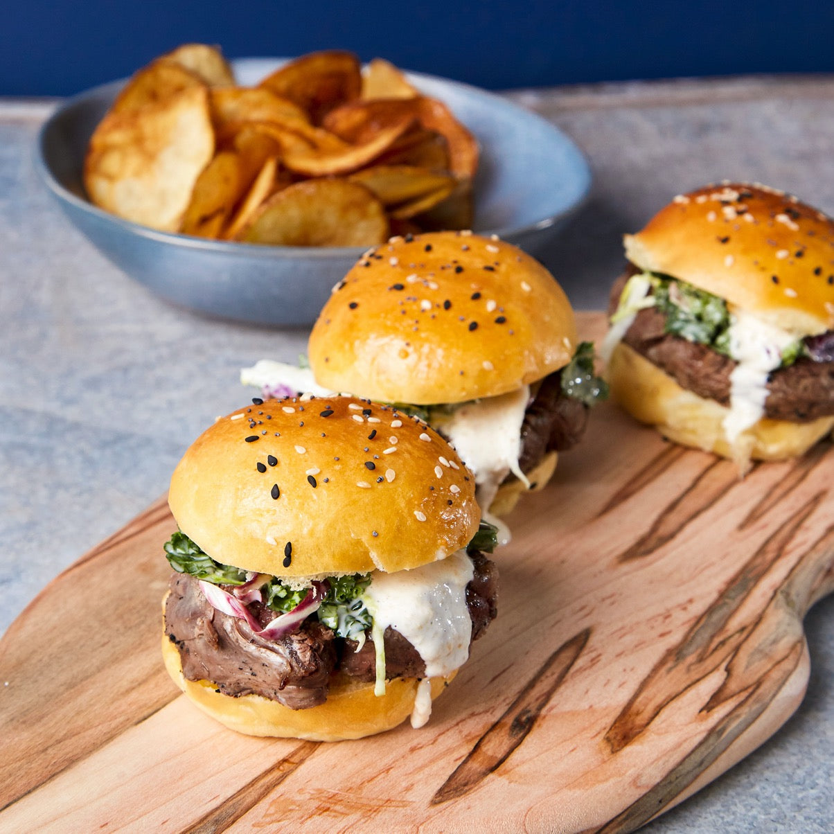Three Filet Sliders on housemade brioche with truffle salt housemade chips