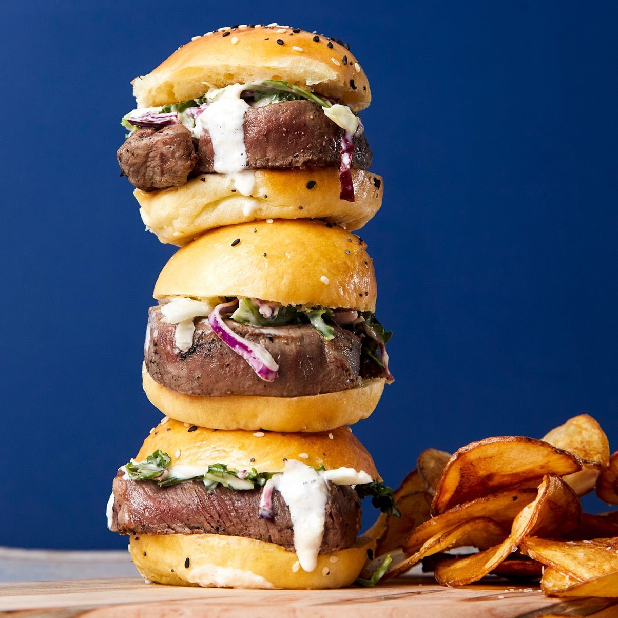 Three Filet Sliders on housemade brioche with truffle salt housemade chips