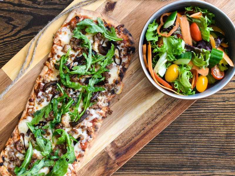 Build your own Woodfired Artisan Flatbread accompanied by a Salerno Salad